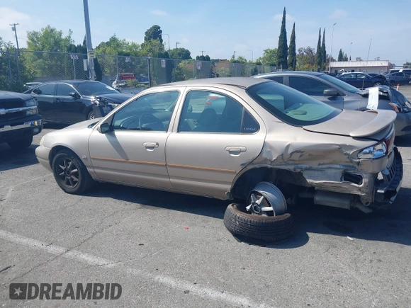 1999 Ford Contour z VIN 3FAFP66L6XM102099, wystawiony jako IAAI lot #42161889 z przebiegiem 100 340 mil mil oraz . Historia ofert i sprzedaży dostępna na DreamBid. Obrazek 14.