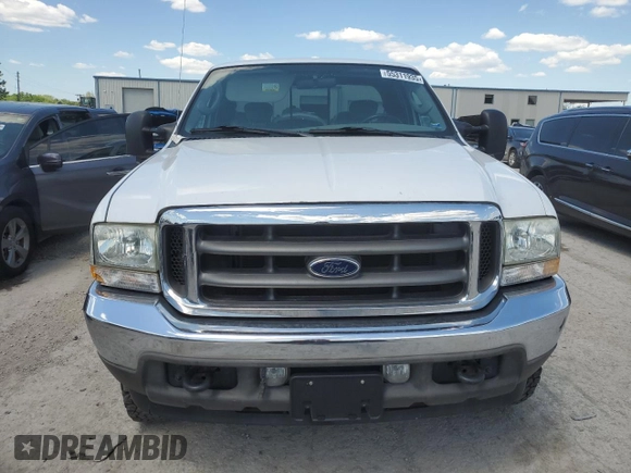 2004 Ford F-250 XL with VIN 1FTNX21P04EA92082, listed as a Copart auction lot 55311935 with 217,363 mi miles and Salvage title. Bid and sale history available at DreamBid. Image 5.