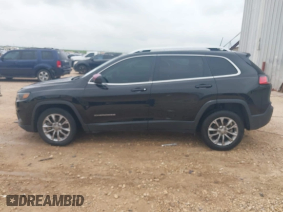 2019 Jeep Cherokee Altitude with VIN 1C4PJLLBXKD280354, listed as a IAAI auction lot 42124578 with 162,289 mi miles and . Bid and sale history available at DreamBid. Image 14.
