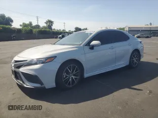 2023 Toyota Camry SE with VIN 4T1G11AK7PU127411, listed as a Copart auction lot 56934575 with 67,485 mi miles and Salvage title. Bid and sale history available at DreamBid. Image 1.