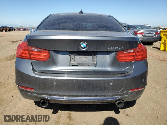 2015 BMW 3 Series 335i with VIN WBA3A9C57FK473104, listed as a Copart auction lot 54974185 with 112,370 mi miles and Salvage title. Bid and sale history available at DreamBid. Image 6.