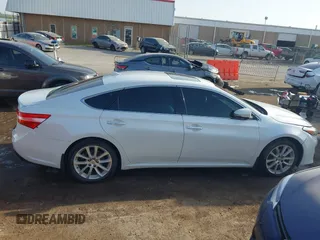 2013 Toyota Avalon XLE with VIN 4T1BK1EB8DU065806, listed as a IAAI auction lot 42043614 with 197,049 mi miles and . Bid and sale history available at DreamBid. Image 14.