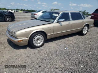 1999 Jaguar XJ z VIN SAJKD6042XC876937, wystawiony jako Copart lot #66366064 z przebiegiem 121 747 mil mil oraz Czysty tytuł • Clean title. Historia ofert i sprzedaży dostępna na DreamBid. Obrazek 1.