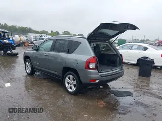 2014 Jeep Compass Latitude with VIN 1C4NJCEB2ED522109, listed as a IAAI auction lot 40282558 with 168,954 mi miles and . Bid and sale history available at carsss.com. Image 3.