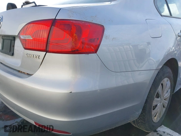 2013 Volkswagen Jetta Sedan S with VIN 3VW2K7AJ1DM288114, listed as a IAAI auction lot 41649329 with 200,736 mi miles. Bid and sale history available at carsss.com. Image 6.