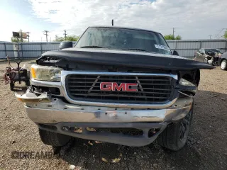 2000 GMC Yukon SLT with VIN 1GKEK13T3YJ202112, listed as a Copart auction lot 71713084 with 303,866 mi miles and Salvage Title. Bid and sale history available at carsss.com. Image 5.