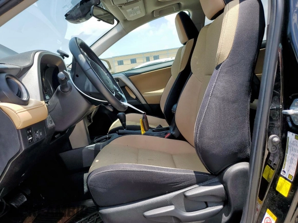 2018 Toyota RAV4 XLE with VIN 2T3WFREV2JW433186, listed as a Copart auction lot 61008705 with 57,310 mi miles and Salvage title. Bid and sale history available at DreamBid. Image 7.