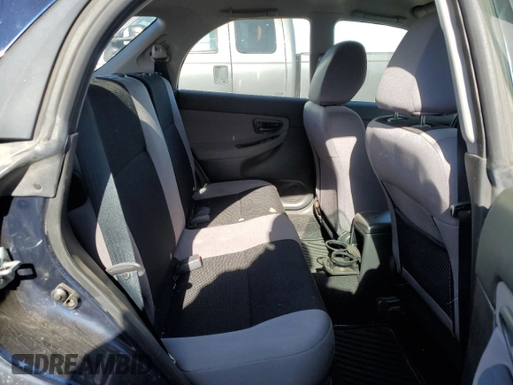 2006 Subaru Impreza i z VIN JF1GG67646H803207, wystawiony jako Copart lot #76921354 z przebiegiem 141 789 mil mil oraz Szkoda całkowita • Salvage title. Historia ofert i sprzedaży dostępna na DreamBid. Obrazek 11.
