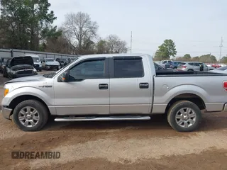 2012 Ford F-150 XL with VIN 1FTFW1CF5CFB63372, listed as a IAAI auction lot 41747703 with 202,219 mi miles. Bid and sale history available at carsss.com. Image 14.