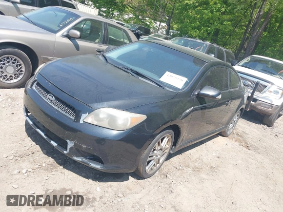 2005 Scion tC with VIN JTKDE177750026736, listed as a IAAI auction lot 42075370 with 246,192 mi miles. Bid and sale history available at carsss.com. Image 2.