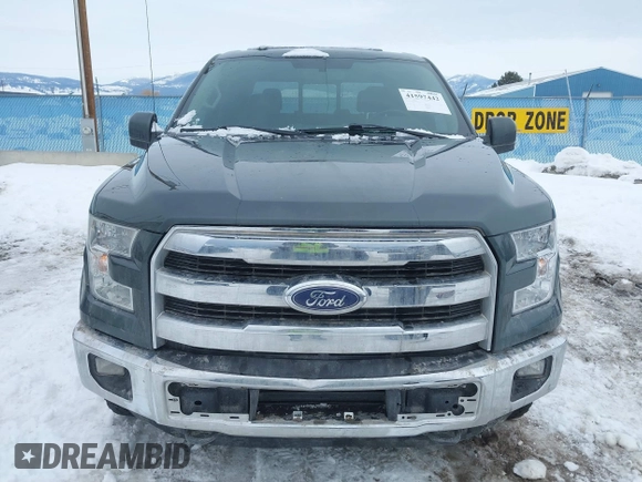 2015 Ford F-150 XLT with VIN 1FTEW1EP6FFB48630, listed as a IAAI auction lot 41597442 with 128,428 mi miles. Bid and sale history available at carsss.com. Image 12.