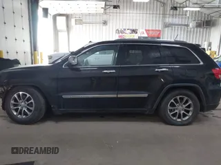 2013 Jeep Grand Cherokee Overland with VIN 1C4RJFCT7DC524005, listed as a IAAI auction lot 42116097 with 126,942 mi miles. Bid and sale history available at carsss.com. Image 14.