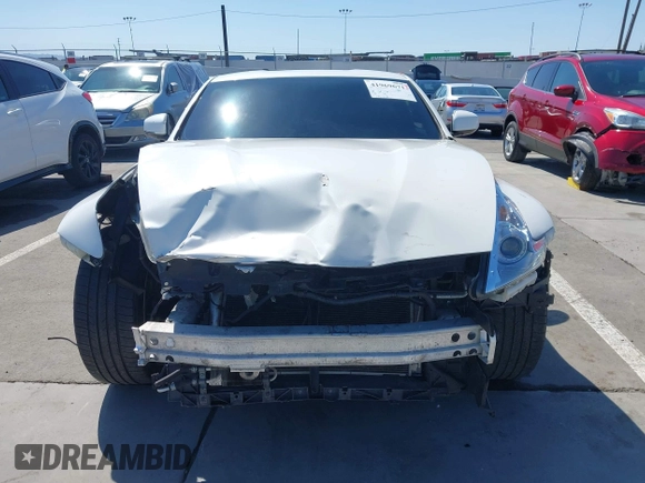 2009 Nissan 370Z Touring with VIN JN1AZ44E99M411252, listed as a IAAI auction lot 41969671 with 91,873 mi miles and . Bid and sale history available at DreamBid. Image 12.