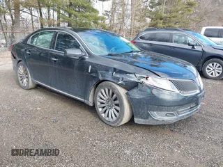 2015 Lincoln MKS with VIN 1LNHL9DK0FG607795, listed as a IAAI auction lot 41659668 with 203,776 mi miles. Bid and sale history available at carsss.com. Image 1.