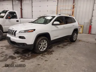 2014 Jeep Cherokee Latitude with VIN 1C4PJMCS4EW318353, listed as a IAAI auction lot 41945598 with 179,425 mi miles and . Bid and sale history available at DreamBid. Image 17.