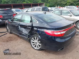 2012 Hyundai Azera z VIN KMHFH4JG2CA174846, wystawiony jako IAAI lot #42477082 z przebiegiem 73 371 mil mil oraz . Historia ofert i sprzedaży dostępna na DreamBid. Obrazek 3.