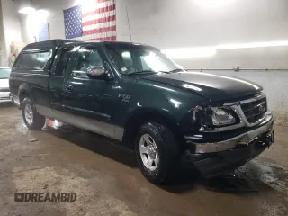2002 Ford F-150 XL with VIN 1FTRX17L22NB97610, listed as a Copart auction lot 47186355 with 70,767 mi miles and Salvage title. Bid and sale history available at DreamBid. Image 4.