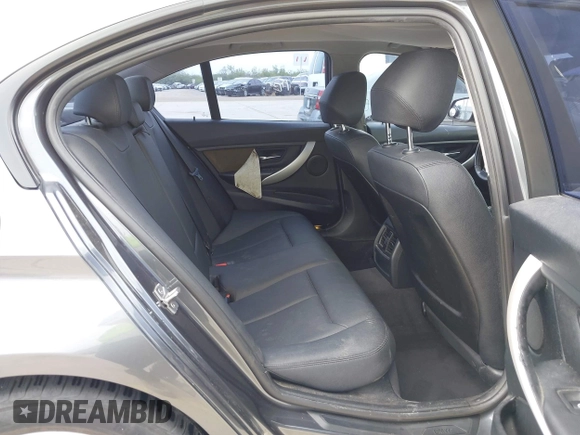 2013 BMW 3 Series 320i with VIN WBA3B1C53DK128602, listed as a IAAI auction lot 41952771 with 103,564 mi miles and . Bid and sale history available at carsss.com. Image 8.