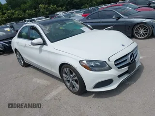 2017 Mercedes-Benz C 300 z VIN 55SWF4JB0HU201974, wystawiony jako IAAI lot #42321027 z przebiegiem 124 958 mil mil oraz . Historia ofert i sprzedaży dostępna na DreamBid. Obrazek 1.