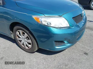 2010 Toyota Corolla with VIN 1NXBU4EE7AZ216331, listed as a IAAI auction lot 41811069 with 235,599 mi miles. Bid and sale history available at carsss.com. Image 12.