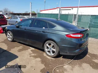 2015 Ford Fusion SE with VIN 3FA6P0H78FR299257, listed as a IAAI auction lot 42104541 with 122,986 mi miles. Bid and sale history available at carsss.com. Image 3.