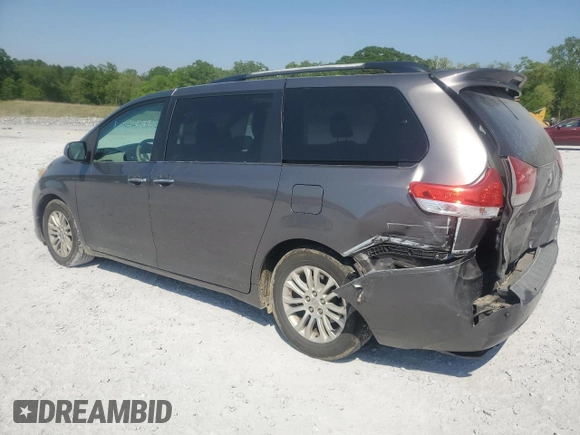 2011 Toyota Sienna XLE AAS с VIN 5TDYK3DC1BS170967, выставлен на аукционе Copart как лот 53848955 с пробегом 171 115 миль миль и Списание • Salvage title. История ставок и продаж доступна на DreamBid. Изображение 2.