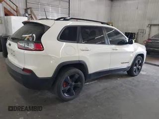 2019 Jeep Cherokee Latitude Plus with VIN 1C4PJMLBXKD294213, listed as a IAAI auction lot 40593826 with 107,332 mi miles. Bid and sale history available at carsss.com. Image 4.