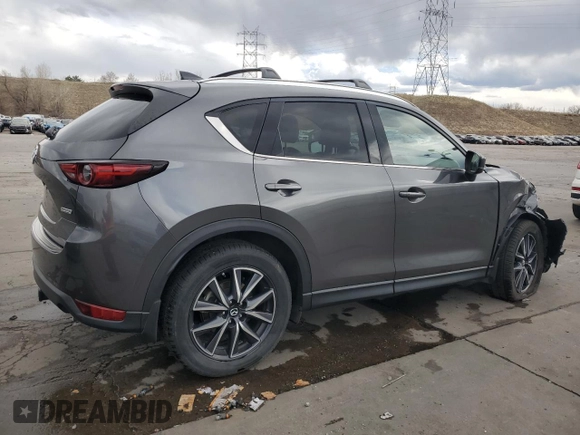 2017 Mazda CX-5 Grand Touring with VIN JM3KFBDL4H0163339, listed as a Copart auction lot 50566495 with 83,453 mi miles and Salvage Title. Bid and sale history available at carsss.com. Image 3.