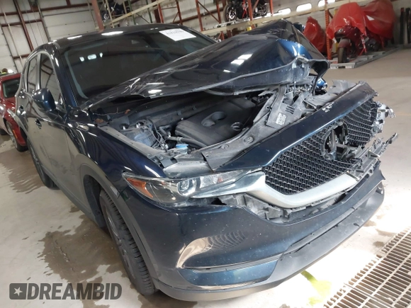 2020 Mazda CX-5 Touring with VIN JM3KFBCM6L0739077, listed as a IAAI auction lot 41810946 with 82,911 mi miles and . Bid and sale history available at carsss.com. Image 6.