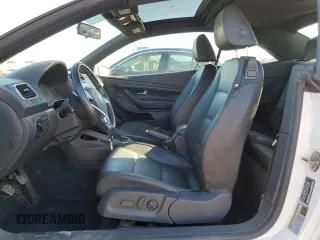 2009 Volkswagen Eos Komfort с VIN WVWAA71F79V011641, выставлен на аукционе Copart как лот 42577045 с пробегом 66 543 миль миль и Списание • Salvage title. История ставок и продаж доступна на DreamBid. Изображение 7.