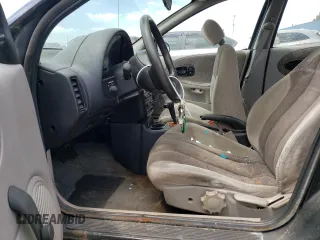 1997 Saturn SW z VIN 1G8ZK8279VZ361444, wystawiony jako Copart lot #58929684 z przebiegiem 128 554 mil mil oraz Tytuł czysty. Historia ofert i sprzedaży dostępna na DreamBid. Obrazek 7.