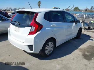 2016 Honda Fit LX with VIN JHMGK5H5XGS012952, listed as a IAAI auction lot 41625842 with 126,451 mi miles. Bid and sale history available at carsss.com. Image 4.