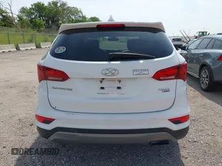 2017 Hyundai Santa Fe 2.4L with VIN 5NMZTDLB5HH018198, listed as a IAAI auction lot 42523632 with 144,883 mi miles and . Bid and sale history available at DreamBid. Image 17.