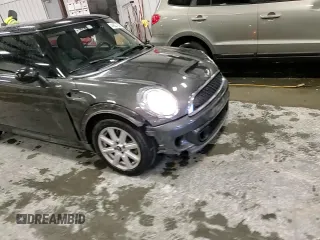 2013 MINI Hardtop S with VIN WMWSV3C53DT390693, listed as a Copart auction lot 44827925 with 131,411 mi miles and Salvage Title. Bid and sale history available at DreamBid. Image 11.