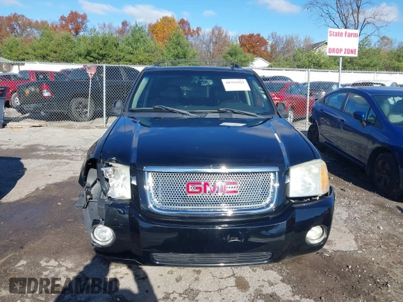 2006 GMC Envoy Denali with VIN 1GKET63M462257064, listed as a IAAI auction lot 40793921 with 179,304 mi miles. Bid and sale history available at carsss.com. Image 13.