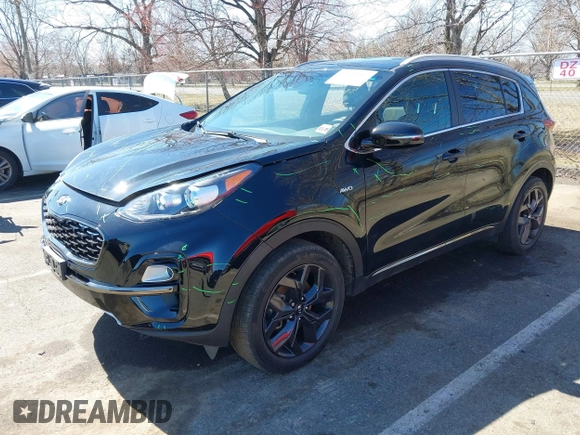 2021 Kia Sportage S with VIN KNDP6CAC6M7887592, listed as a IAAI auction lot 41852917 with 52,185 mi miles and . Bid and sale history available at DreamBid. Image 2.