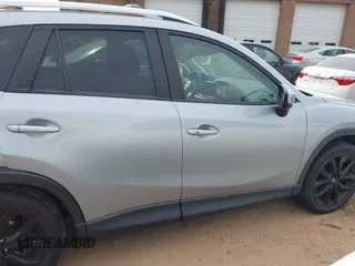 2016 Mazda CX-5 Grand Touring with VIN JM3KE4DY1G0616714, listed as a IAAI auction lot 41459781 with 90,763 mi miles. Bid and sale history available at carsss.com. Image 13.