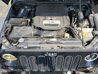 2015 Jeep Wrangler Unlimited Sport with VIN 1C4BJWDG1FL668395, listed as a Copart auction lot 64035035 with 79,972 mi miles and Salvage title. Bid and sale history available at DreamBid. Image 11.