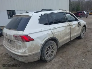 2021 Volkswagen Tiguan SE with VIN 3VV2B7AX4MM009456, listed as a IAAI auction lot 41876861 with 72,203 mi miles. Bid and sale history available at carsss.com. Image 4.