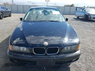 2000 BMW 5 Series 528iA with VIN WBADM6344YGU10257, listed as a IAAI auction lot 41773733 with 231,028 mi miles. Bid and sale history available at carsss.com. Image 6.