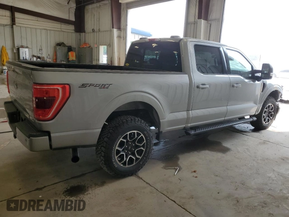 2021 Ford F-150 XL with VIN 1FTFW1E85MKE03933, listed as a Copart auction lot 60513185 with 82,793 mi miles and Salvage title. Bid and sale history available at DreamBid. Image 3.