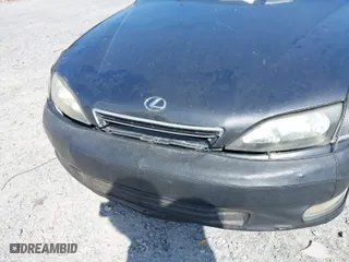 2000 Lexus ES 300 with VIN JT8BF28G2Y5089166, listed as a IAAI auction lot 42004449 with 326,305 mi miles. Bid and sale history available at carsss.com. Image 6.