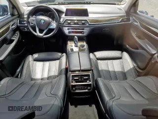 2016 BMW 7 Series 740i with VIN WBA7E2C57GG714564, listed as a Copart auction lot 64005965 with 111,598 mi miles and Salvage title. Bid and sale history available at DreamBid. Image 8.