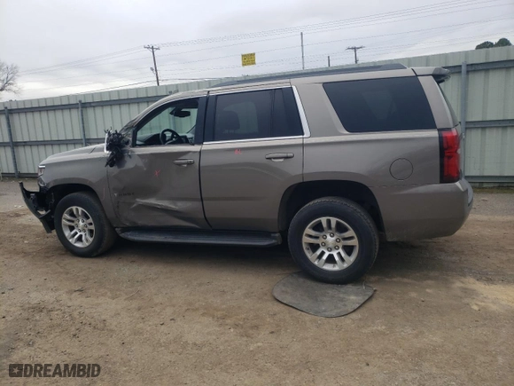 2017 Chevrolet Tahoe LS with VIN 1GNSCAKC2HR192453, listed as a Copart auction lot 45001995 with 214,091 mi miles and Salvage Title. Bid and sale history available at carsss.com. Image 2.