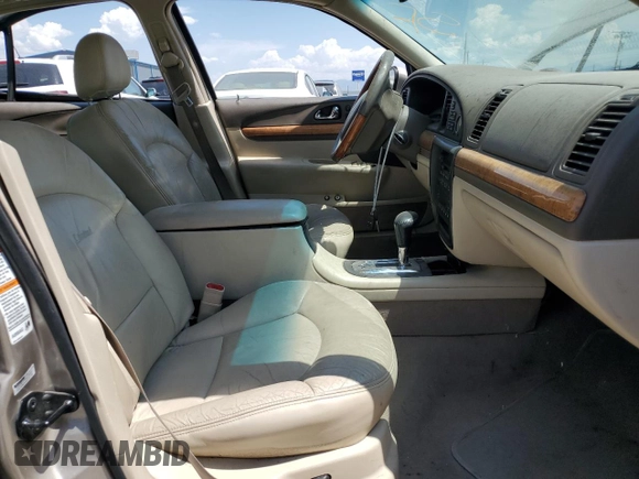 2001 Lincoln Continental z VIN 1LNHM97V21Y698784, wystawiony jako Copart lot #64040134 z przebiegiem Nie podano mil oraz Szkoda całkowita • Salvage title. Historia ofert i sprzedaży dostępna na DreamBid. Obrazek 7.