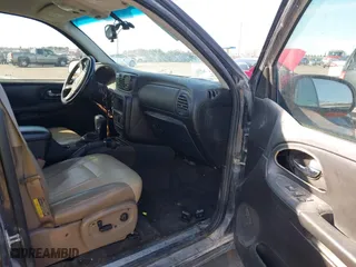 2005 Chevrolet TrailBlazer LS with VIN 1GNET16S756205497, listed as a IAAI auction lot 41766469 with 227,910 mi miles. Bid and sale history available at carsss.com. Image 5.