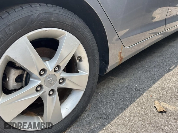 2012 Hyundai Elantra Limited z VIN KMHDH4AE6CU422133, wystawiony jako Copart lot #61023095 z przebiegiem 141 500 mil mil oraz Czysty tytuł • Clean title. Historia ofert i sprzedaży dostępna na DreamBid. Obrazek 7.