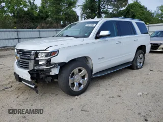 2016 Chevrolet Tahoe LTZ z VIN 1GNSKCKC4GR208861, wystawiony jako Copart lot #56832895 z przebiegiem 132 982 mil mil oraz Szkoda całkowita • Salvage title. Historia ofert i sprzedaży dostępna na DreamBid. Obrazek 1.