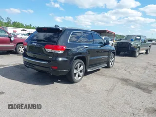 2014 Jeep Grand Cherokee Overland with VIN 1C4RJECG8EC417995, listed as a IAAI auction lot 41959550 with 155,029 mi miles. Bid and sale history available at carsss.com. Image 4.
