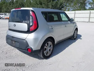 2014 Kia Soul + with VIN KNDJP3A57E7725296, listed as a IAAI auction lot 42084611 with 223,610 mi miles. Bid and sale history available at carsss.com. Image 4.